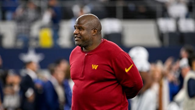 Nov 23, 2023; Arlington, Texas, USA; Washington Commanders offensive coordinator Eric Bieniemy before the game between the Dallas Cowboys and the Washington Commanders at AT&T Stadium. Mandatory Credit: Jerome Miron-USA TODAY Sports  